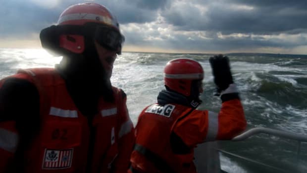 Members of Coast Guard Station Sandy Hook, New Jersey, call out directions during a heavy-weather man-overboard drill off the coast of New Jersey on January 8, 2009. Photograph taken by Petty Officer Seth Johnson. 