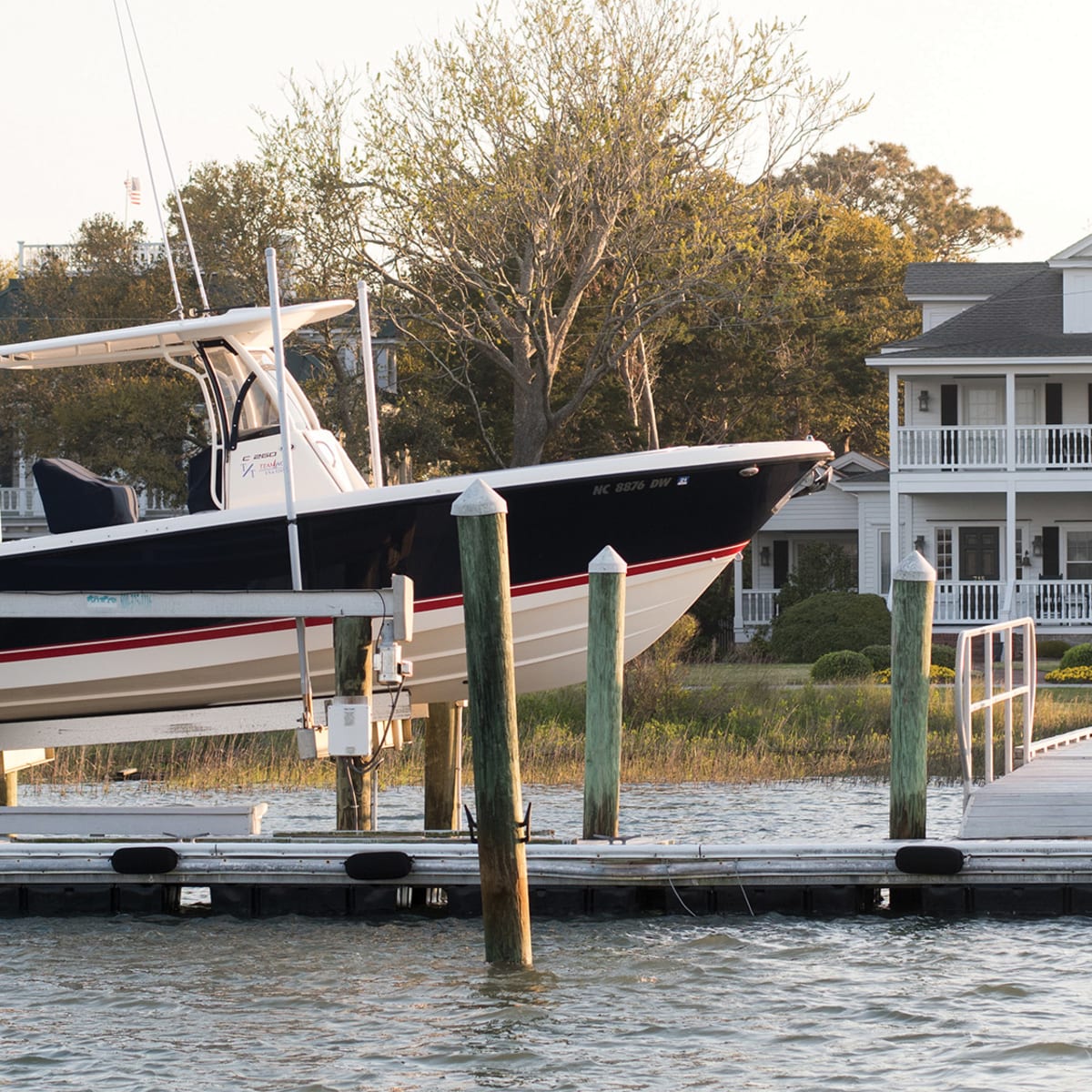 A boat lift is a device that allows boats to be raised and lowered