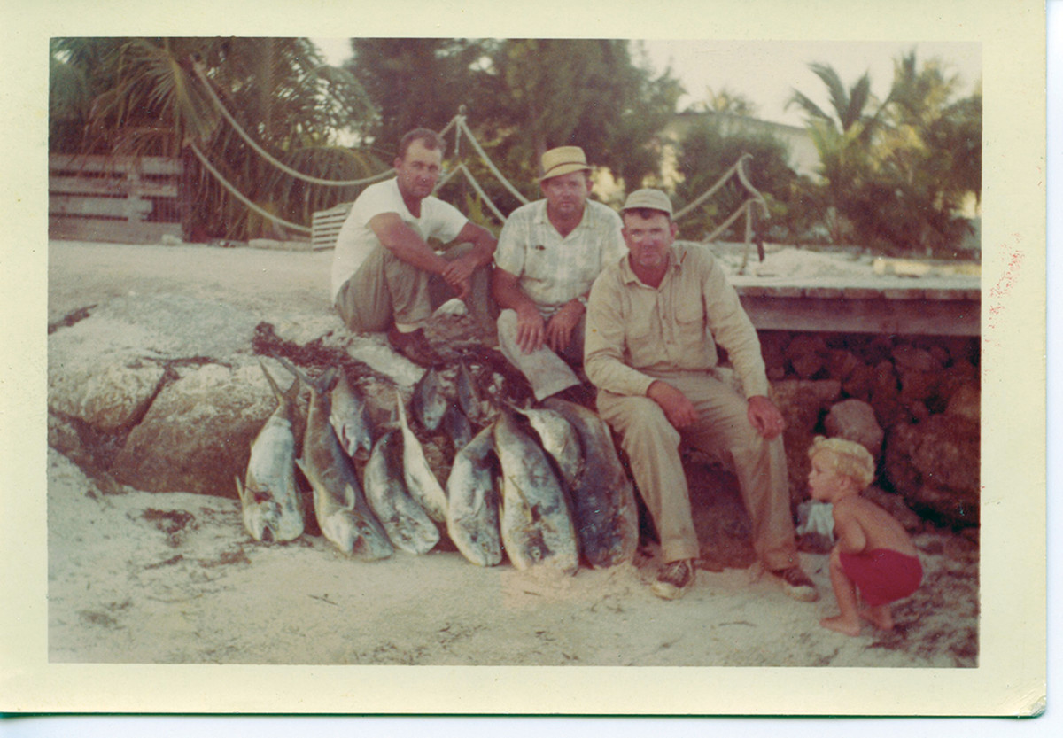 The author (in red) caught the fishing bug from his father (third from left).