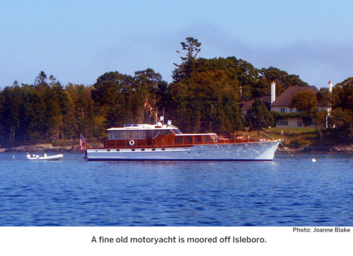 A fine old motoryacht is moored off Isleboro.