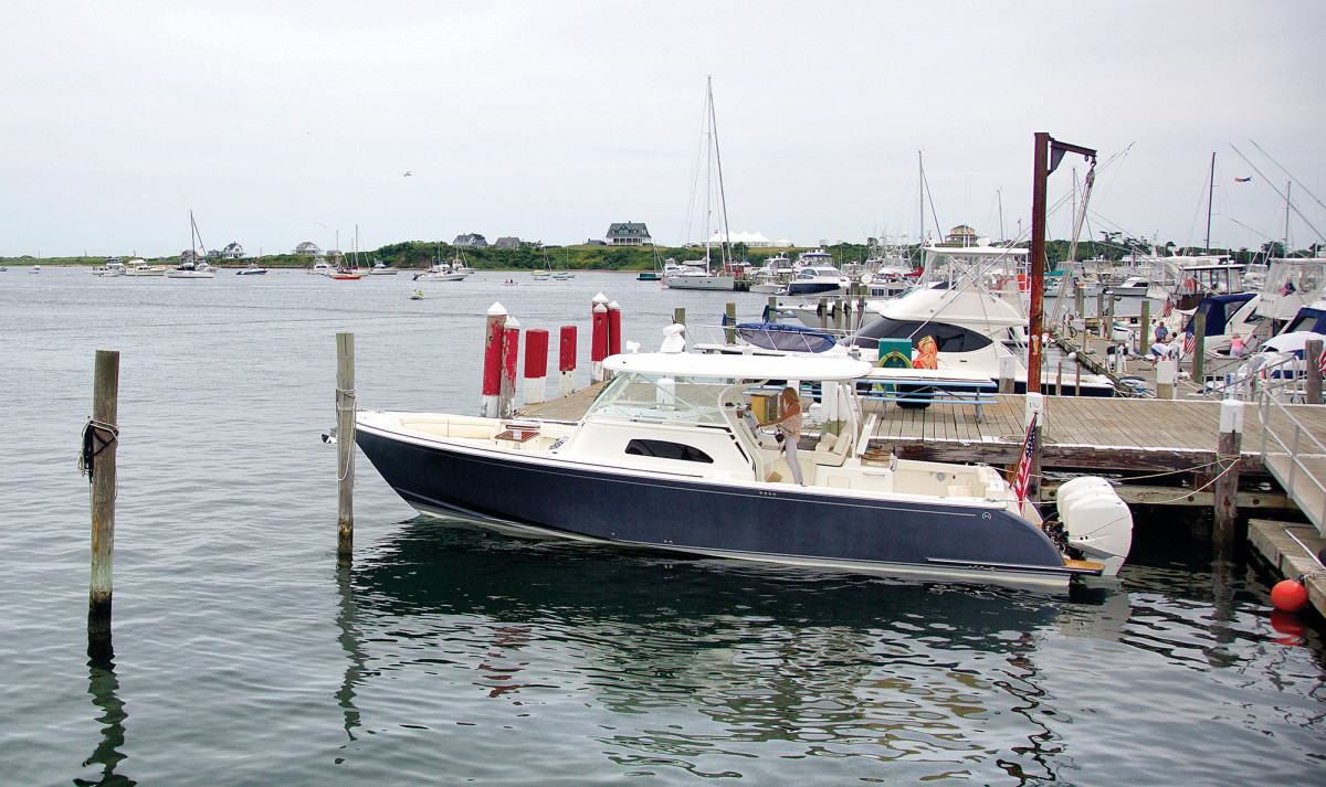 We arrive at the Block Island Boat Basin in less than an hour, thanks to triple 400-hp Mercury Racing outboards on the transom.