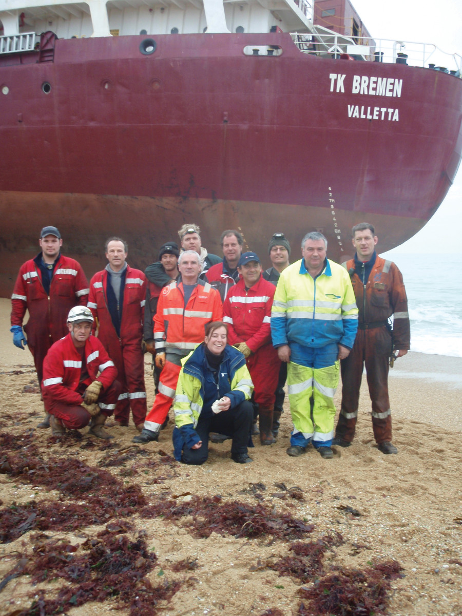 Sylvia in the midst of a job involving a Maltese-registered cargo ship. She and a worldly team of Smit salvors were able to offload the vessel, which was eventually cut into pieces and hauled away in trucks. A ramp of sand was built so all the fuel oil that remained onboard could be removed.