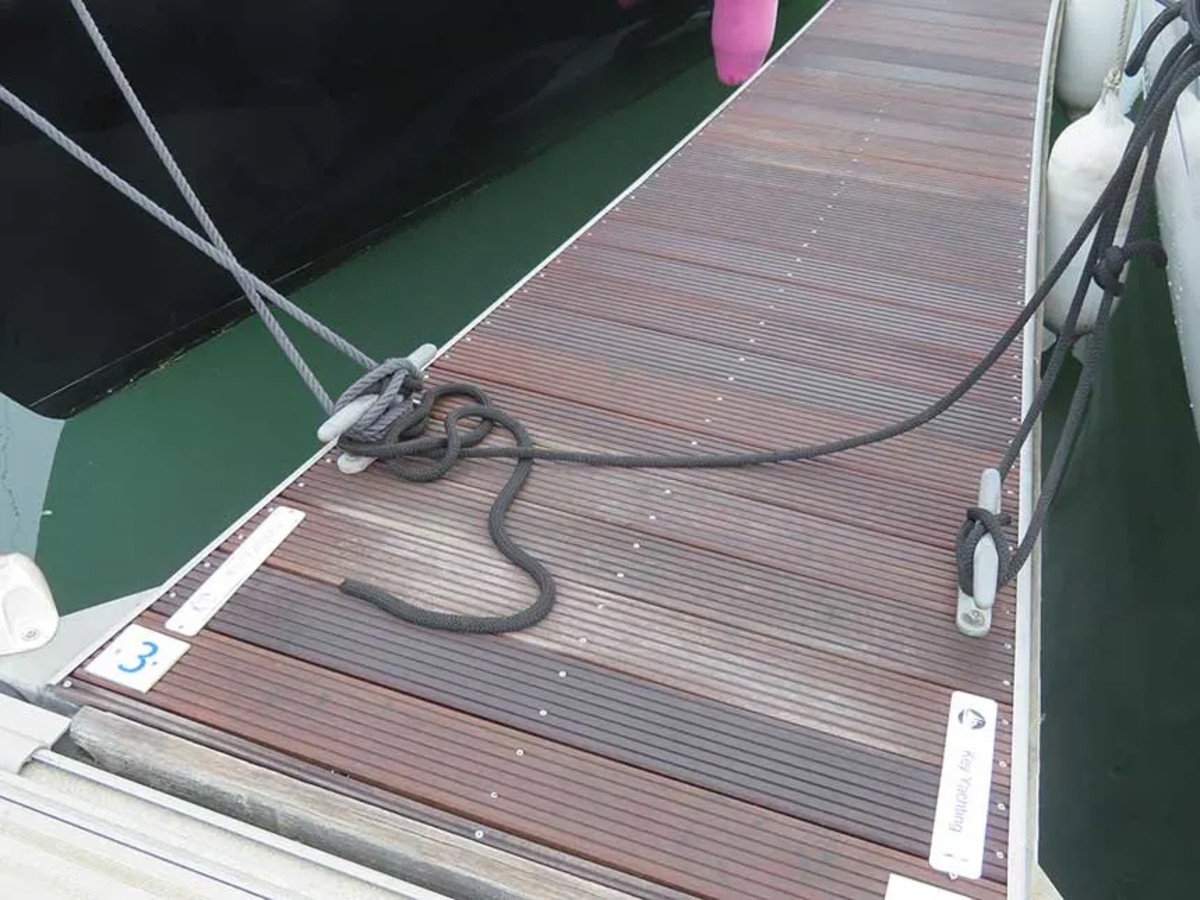 You should never take your mooring line across to the far side of the pontoon, nor should you jam up somebody else’s line by adding yours to the fray.