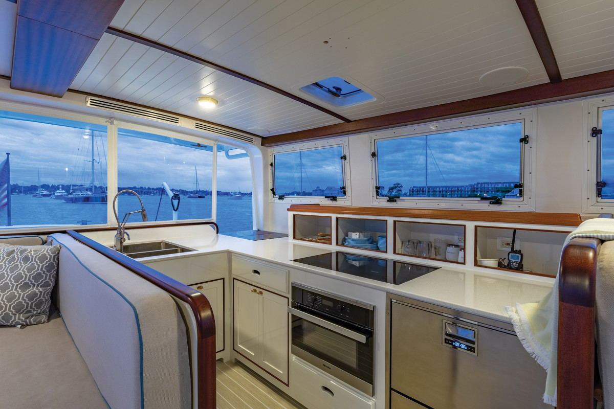 The spacious galley-up design in the pilothouse features large appliances and a deep sink.