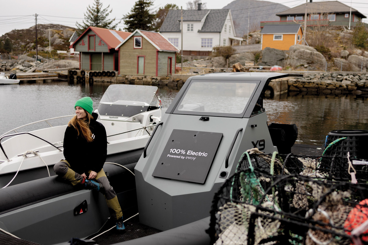 Photographer Helle Frogner taking a breather on the Evoy Explorer.