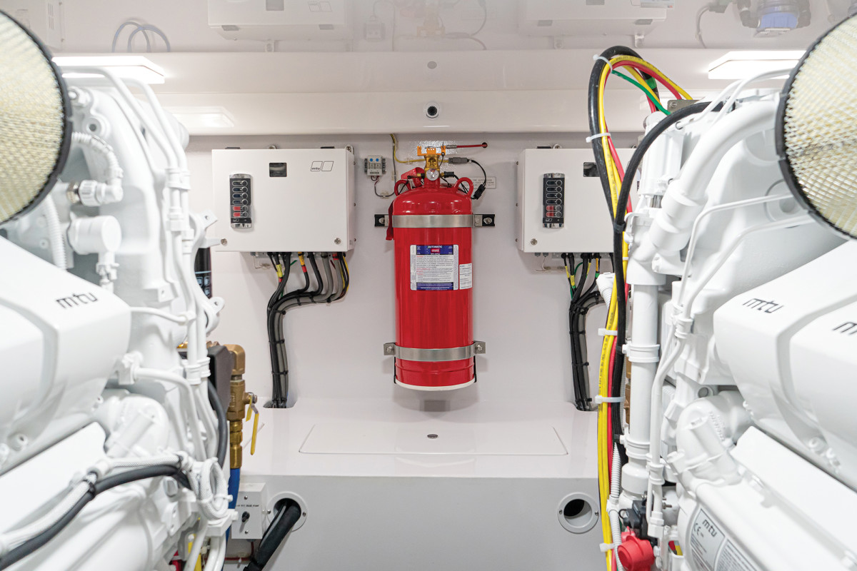 A Sea-Fire pre-engineered system stands at the ready inside the engine room of a Viking 58C.