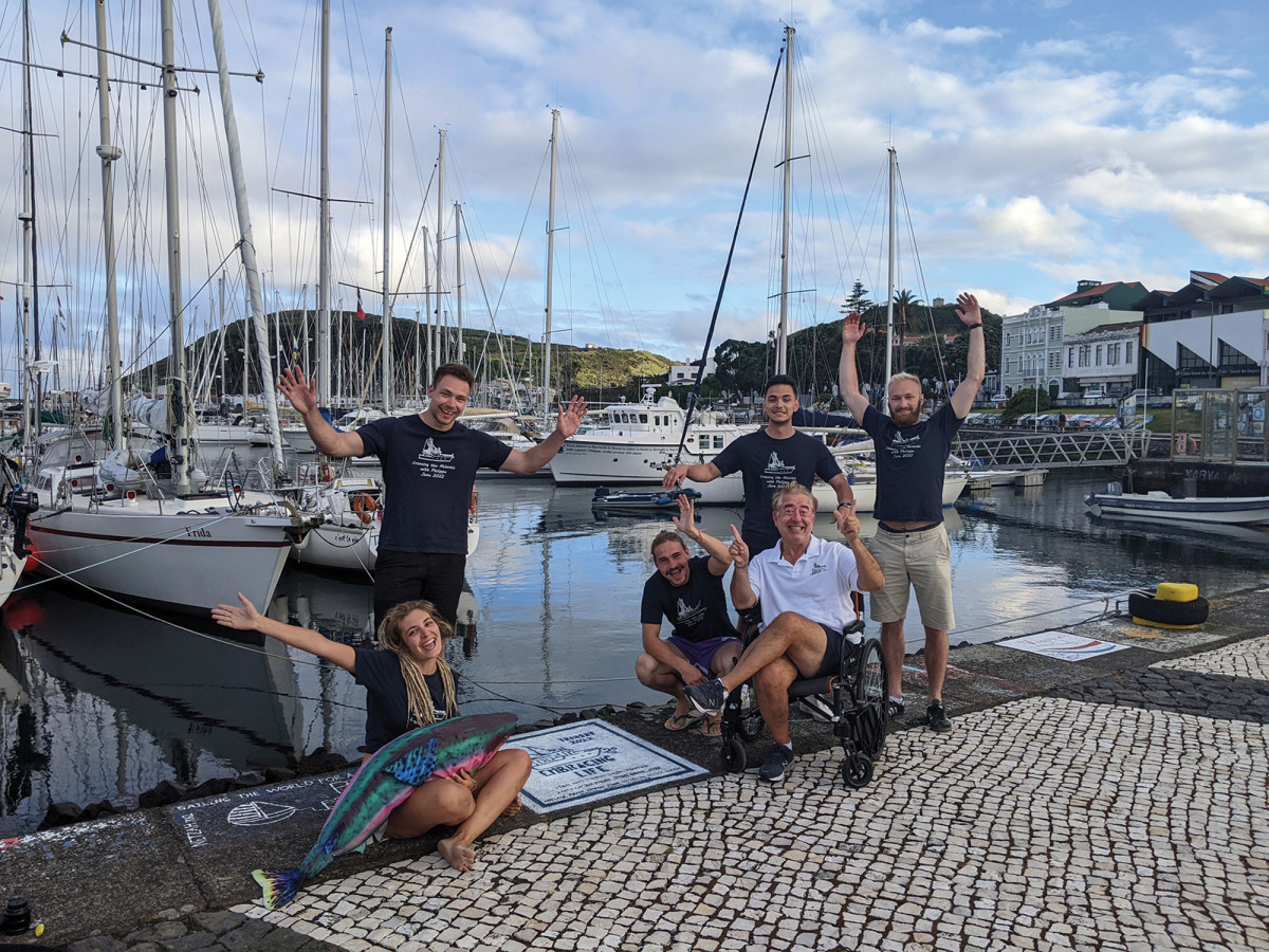The Embracing Life crew posing before beginning the third and final leg of the Atlantic crossing.